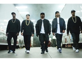 This photo provided by Universal Pictures shows, Aldis Hodge, from left, as MC Ren, Neil Brown, Jr. as DJ Yella, Jason Mitchell as Eazy-E, OíShea Jackson, Jr. as Ice Cube and Corey Hawkins as Dr. Dre, in the film, ìStraight Outta Compton." The movie released in U.S. theaters on Friday, Aug. 14, 2015. (Jaimie Trueblood/Universal Pictures via AP)