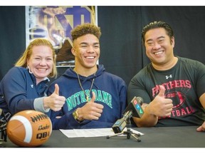 It’s thumbs up all around Wednesday for former Abbotsford Panther Chase Claypool, centre, his mother Jasmine Claypool, and high school coach Jay Fujimura.