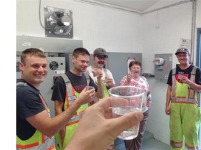 Toasting victory are Clearbrook Waterworks District workers, from left, James Wiens, Thomas Page, Ryan Federa, Kathleen Selinger and Clint Holness.   — Jason Hildebrandt photo