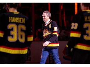 Trevor Linden smiles as he is honoured during a ceremony Saturday celebrating 20 years of Canucks games at Rogers Arena. There wasn’t much for him to smile about after Vancouver’s 5-2 loss to the Toronto Maple Leafs.