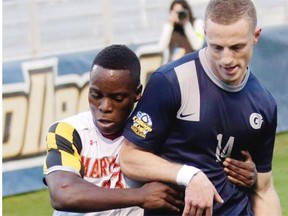 University of Maryland’s Schillo Tshuma, left, and Georgetown’s Cole Seiler battle for the ball in 2012. Seiler, picked by the Whitecaps in the MLS SuperDraft Thursday, co-captained the Hoyas to their first Big East tournament title in 2015.