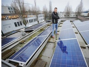 Bryan Ward has spent thousands of dollars installing solar panels on his roof, among other energy-saving installations, and now it appears the city is allowing a building across the street to exceed height restriction by 50 per cent, which will block significant sun to his solar panels. in Vancouver  on March 14, 2016.