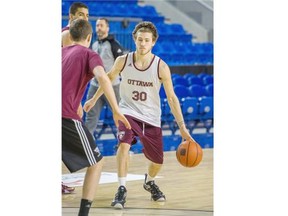 Ottawa Gee-Gees Michael L'Africain in action during the team's practice prior to the CIS men´s basketball championship Final 8 tournament at the Doug Mitchell Thunderbird Sports Centre at the University of British Columbia in Vancouver Wednesday March 16, 2016.