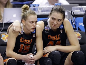 Ruth Hamblin (right) of Houston, BC, was picked by the Dallas Wings in the WNBA draft. Her Oregon State teammate Jamie Weisner (left) was drafted by the Connecticut Sun (AP photo)