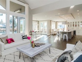 Wide walls of windows infuse the Morgan Crest showhome in South Surrey with plenty of natural light to give the space an airy feel.