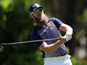 Graham DeLaet (that's him behind the glasses and epic beard) is donating cash to the Fort McMurray relief fund as he plays this week in Hilton Head, S.C. (AP)