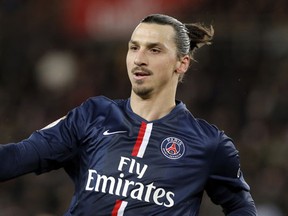 Paris Saint Germain's Zlatan Ibrahimovic gestures during their League One soccer match between Paris Saint Germain and Montpellier,  at Parc des Princes stadium, in Paris. (AP Photo/Francois Mori)