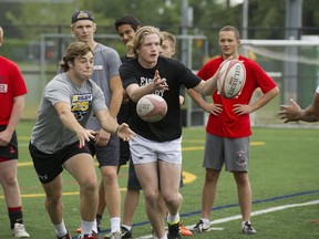 Carson Graham Eagles' Flynn Heyes (left) and Christoph Stangl (black shirt) at practice Tuesday in North Vancouver. The Eagles open Wednesday at the BC triple-A championships against Kelowna. (Mark van Manen, PNG photo)