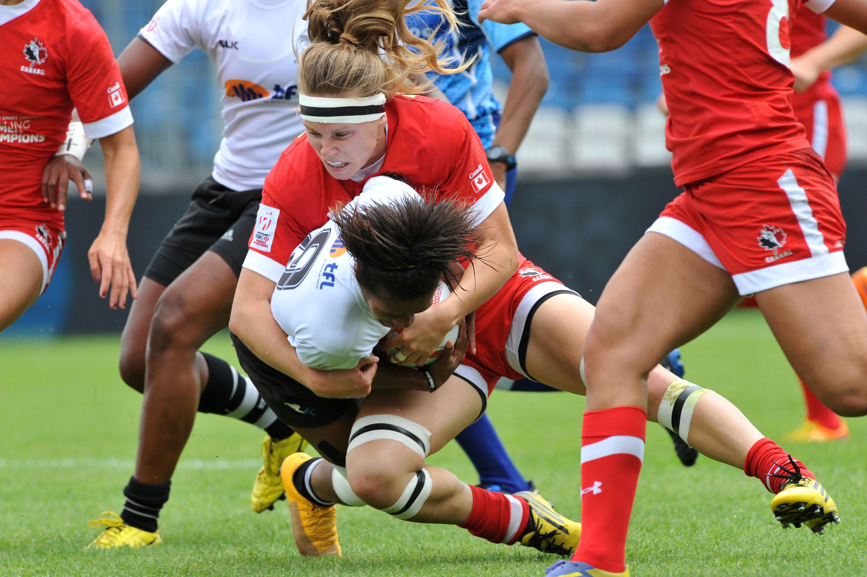 Fiji's Lavenia Tinai is tackled by Canada's Karen Paquin (up) tackles during the HSBC World Rugby Women's Sevens Series match between Canada and Fiji on May 29, 2016 at the Gabriel Montpied stadium in Clermont-Ferrand, central France, on May 29, 2016. AFP PHOTO / THIERRY ZOCCOLAN / AFP / THIERRY ZOCCOLAN (Photo credit should read THIERRY ZOCCOLAN/AFP/Getty Images)