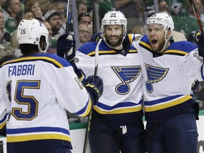 Look at those happy Blues. THE CANADIAN PRESS/AP/LM Otero