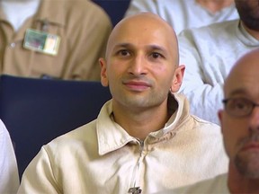 Atif Rafay watches a symphony performance for inmates at the Washington State Reform Unit last week.