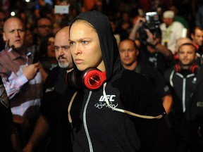 Ronda Rousey marches to the Octagon for her UFC 174 matchup with Alexis Davis.