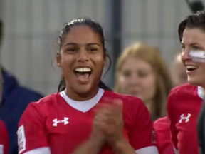 Magali Harvey and Britt Benn were all smiles after Canada's big win in France (and Ghislaine Landry's  post-tournament in-interview f-bomb). (World Rugby)