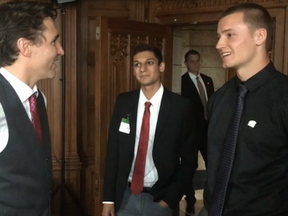 UBC Thunderbirds' quarterback Michael O'Connor (right) gets a chance to talk football with Prime Minister Justin Trudeau on Wednesday on Parliament Hill. (Len Catling, UBC)