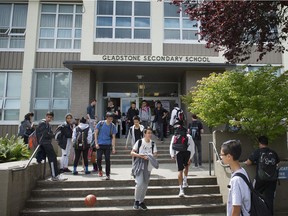 Students walk out of Gladstone secondary school in east Vancouver,  on June 20, 2016. The long running school is one of  the schools the V.S.B. may consider closing.