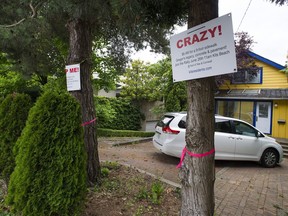 Residents along Point Grey Road are facing further construction, much of which will take away hedges and trees that is on city-owned land in front of their homes, to install a 10-foot-wide sidewalk they say is unneccessary and a waste of tax dollars.