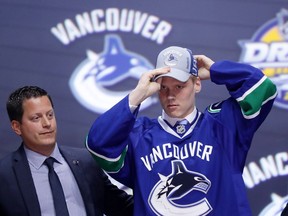 The Canucks went with a puck-moving defenceman, Olli Juolevi, with the fifth pick in the NHL Draft on Friday.
