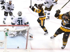 Sidney Crosby (right) celebrates after Conor Sheary scored the winning goal on a play he drew up.
