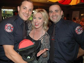 Vancouver firefighters Jamie Olson and Dan Gutierrez, along with auctioneer Dawn Chubai, helped raise funds for the Salvation Army’s Kate Booth House, a safe house for women fleeing domestic violence.