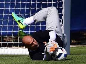 Hungary's goalkeeper Gabor Kiraly, resplendent in his iconic grey sweatpants, takes part in a training session on the eve of the Euro 2016 football match between Hungary and Iceland.