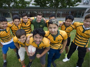 Students athletes from Langley Secondary who were born in refugee camps in Thailand as members of the Karen nation now both great young athletes and active students in the community Here members of the rugby team-- Front: Left: Sbar Pare Saw, centre K'pawshee Htoo, Right: Meeka Gay, Back Row (left to right): Kennedy Shwe, Eh Tha Taw, Ser Ler Pwe, Gay Lah Eh, Eh Hset Ta and Kmwee Htoo.