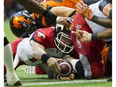 Calgary Stampeders QB #15 Andrew Buckley is stopped on the goal line by the BC Lions in a regular season CFL football game at BC Place, Vancouver June 25 2016.