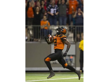 BC Lions #2 Chris Rainey runs a kicked ball back for a touchdown against the Calgary Stampeders in a regular season CFL football game at BC Place, Vancouver June 25 2016.