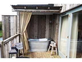 The outdoor tub might be one of many new and modern conveniences, but the Soho Farmhouse in the Cotswolds of England still hearkens back to simpler times.  Mike Grenby
