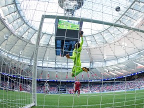 Vancouver Whitecaps' goalkeeper Paolo Tornaghi leaps for the ball as an Ottawa Fury shot goes over the net during first half semifinal Canadian Championship soccer action in Vancouver, B.C., on Wednesday June 8, 2016.