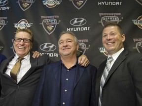 Jason McKee (right) is the new head coach; Glen Hanlon (left) is the new GM. Ron Toigo (centre) is still the Giants' owner.