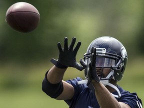 Seattle WR Doug Baldwin, pictured at mini-camp earlier this month, has signed a four-year extension with the Seahawks.