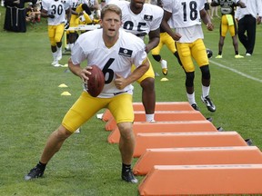 Canadian kicker Shaun Suisham does training camp drills in 2015 with the Pittsburgh Steelers. The team released him after he failed a physical this year.