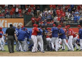 The Toronto Blue Jays and Texas Rangers have a benches clearing brawl during the eighth inning of a baseball game in Arlington, Texas, Sunday, May 15, 2016. (AP Photo/LM Otero)