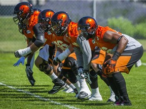 The B.C. Lions' offensive line practises in Surrey on Tuesday. The O-line was two different units against the Calgary Stampeders on Saturday, says the Leos' coaches.