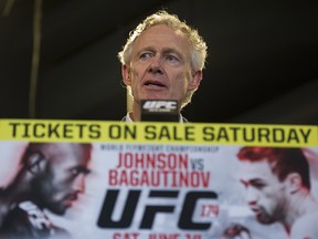 Tom Wright speaks at a press conference promoting a Vancouver UFC event in 2014.