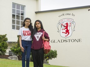 Rhea Bassan (left) and Haidee Pangilinan (right) in front of Gladstone Secondary in Vancouver The high school of more than 1,000 kids is targeted for possible closure and these two students are leading a fight to save the school.