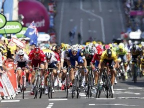 Riders with Germany&#039;s sprinter Marcel Kittel, center, sprint toward the finish line during the fourth stage of the Tour de France cycling race over 237.5 kilometers (147.3 miles) with start in Saumur and finish in Limoges, France, Tuesday, July 5, 2016. (AP Photo/Christophe Ena)