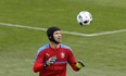 FILE - In this June 12, 2016 file photo Czech Republic&#039;s goalkeeper Petr Cech looks at the ball during a training session at the Toulouse stadium in Toulouse, France. Cech says he is retiring from international football. The 34-year-old Cech announced his decision on Friday, July 8, 2016, saying he wants to fully focus on his Arsenal club. (AP Photo/Manu Fernandez, file)