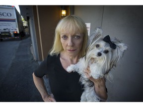 Sharon Sorensen McAfee, the daughter of the woman rescued from a burning building in North Vancouver, thanks rescue crews for their efforts in saving her mother and her mom's dog. Mark van Manen/PNG