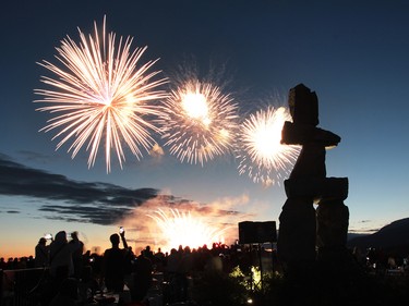 With the Inuk Shuk silhouetted the Celebration of Light lit up the sky over English Bay.  Rob Kruyt Photo