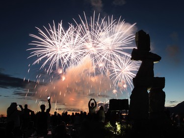 With the Inuk Shuk silhouetted the Celebration of Light lit up the sky over English Bay.  Rob Kruyt Photo