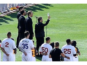 Remigio Pereira of The Tenors changed a line of the Canadian national anthem and held up a sign proclaiming "All Lives Matter" before the MLB baseball All-Star Game in San Diego.