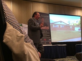 A pitchman who identified himself as Michael from Idaho, but would not disclose his last name when asked, told attendees of the Nick Vertucci seminar in Richmond they could learn how to flip homes in the U.S. and "retire" within three years by following Vertucci's methods. [PNG Merlin Archive]