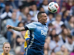 Whitecap Blas Perez wins the header over Colorado Rapid Micheal Azira in MLS action in Vancouver on July 9. Perez will be facing his old mates at FC Dallas when the Caps visit Sunday.