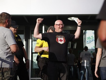 Fans are searched before the start of the first stop of the Tragically Hip's Man Machine Poem Tour outside the Save-On-Foods Memorial Centre in Victoria on Friday.