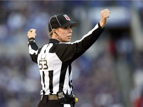 Sarah Thomas signals during a Ravens-Jaguars game in Baltimore on Nov. 15, 2015. She was the first full-time game official in the NFL last season.