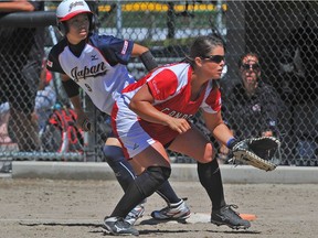 First baseman Natalie Wideman makes a play as Canada was forced to settle for a bronze medal Sunday at the 2016 Women's World Softball Championships as they fell 11-0 to Japan in the semifinals. Photo courtesy of Vision Quest Photographics