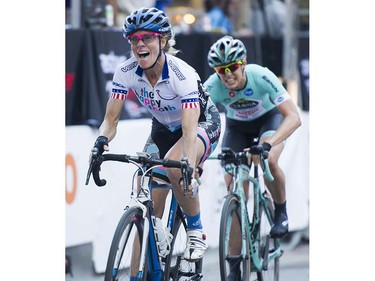 Tina Pic, ( L ), the oldest rider in the race at age 50, beats Kimberly Wells ( R )to win the pro women's race at the Gastown Grand Prix Vancouver, July 13 2016.