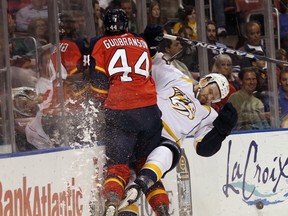 Erik Gudbranson, left, has a reputation for being tough to play against.