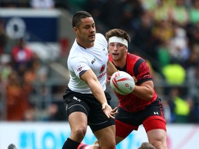 LONDON, ENGLAND - MAY 21: Jarryd Hayne of Fiji off loads the ball in the tackle during the pool round match between Fiji and Wales during the HSBC London Sevens at Twickenham Stadium on May 21, 2016 in London, United Kingdom.